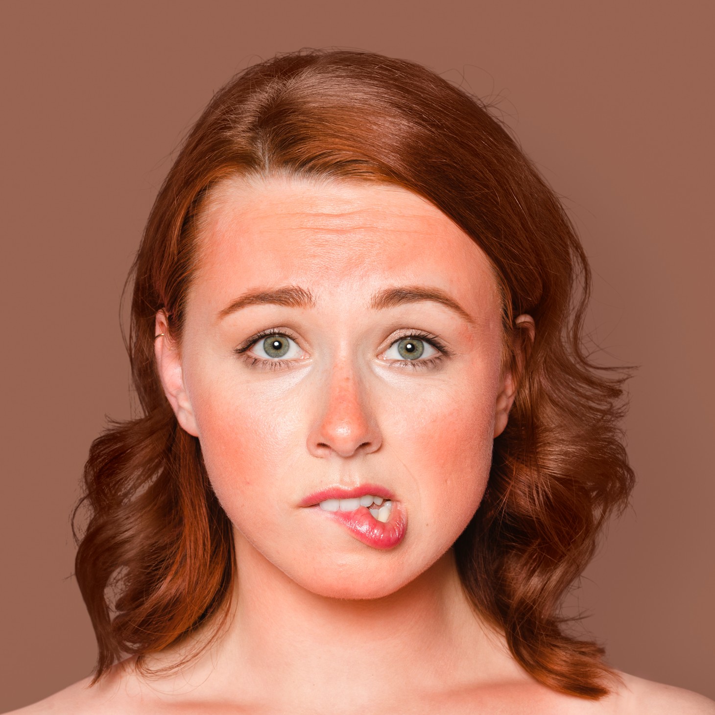 https://hormonehub.org/wp-content/uploads/2025/05/sunburnt-woman-face-portrait-biting-her-lips-1.jpg